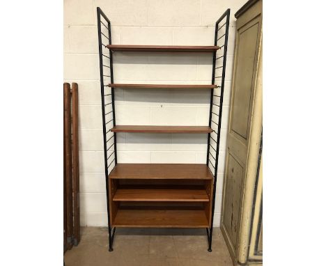 Vintage Ladderax, comprising two black metal uprights, box shelf unit and three narrow over shelves, approximately 94cm wide