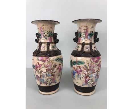 Oriental Ceramics, pair of Chinese Nanking crackle glaze vases decorated with paintings of Chinese warriors and three dimensi