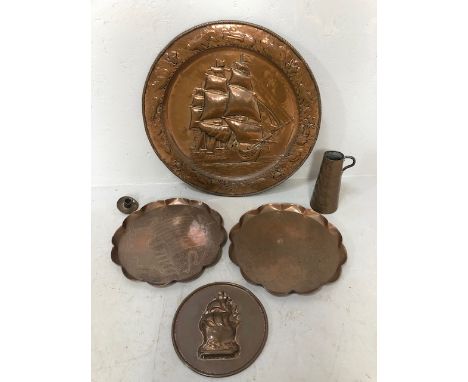 Arts and Crafts style copper ware, large copper charger with a sailing ship the rim decorated with sea creatures, three coppe
