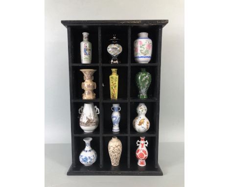 Collection of Chinese ceramic vessels, showing the various shapes and designs of Chinese pottery through time, 12 in total ho