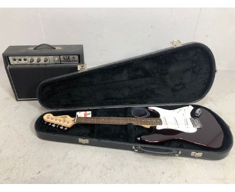 Electric guitar, Fender Squire Stratocaster, Number 5121691 in a hard case along with a Capricorn LS8 amplifier   