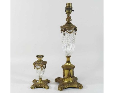 An ornate early 20th century gilt metal and glass table lamp, together with another smaller (2)40cm&nbsp; and 16cm high