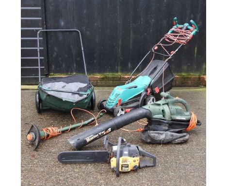 A large collection of garden tools, to include a petrol chainsaw, hand tools and two aluminium ladders