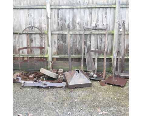 A collection of 19th century and later antique iron scales, together with various iron weights, scales, a wooden hopper and t