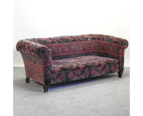 An early 20th century chesterfield sofa, upholstered in printed French velvet, on tapered feet190w x 86d x 71h cmCondition re