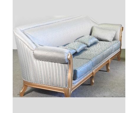 A large gilt framed pale blue upholstered sofa280w x 82d x 96h cm