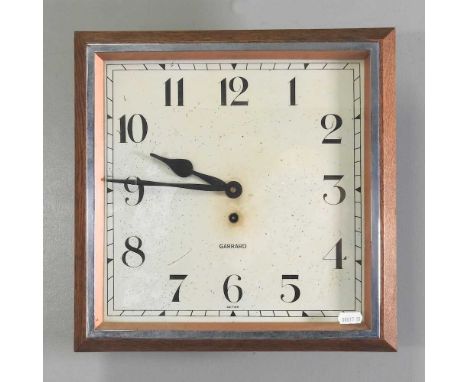 An Art Deco style wall clock, signed Garrard, with a square dial36cm