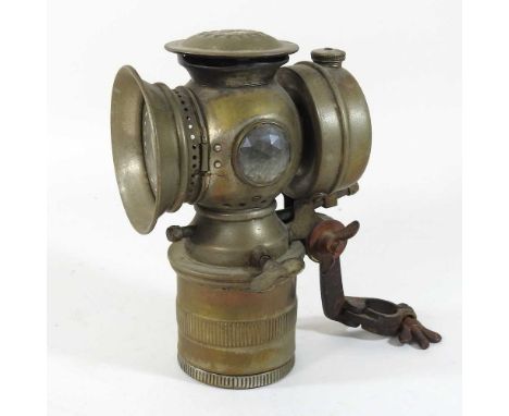 An early 20th century bicycle light19cm high