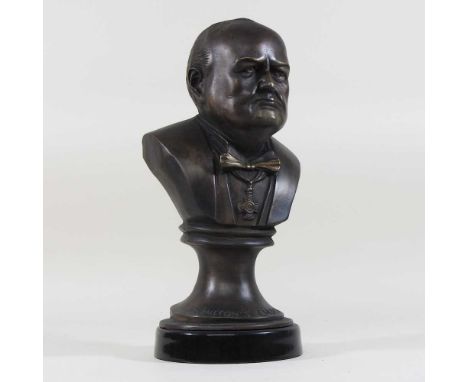 A modern bronzed portrait bust of Winston Churchill, on a socle base33cm high