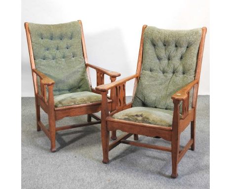 A pair of Arts and Crafts light oak armchairs, with green upholstery70d x 66w x 98h cmCondition report: The frames are solid 