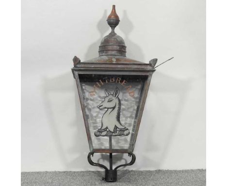 A copper garden lantern, with glazed advertising panel90cm high