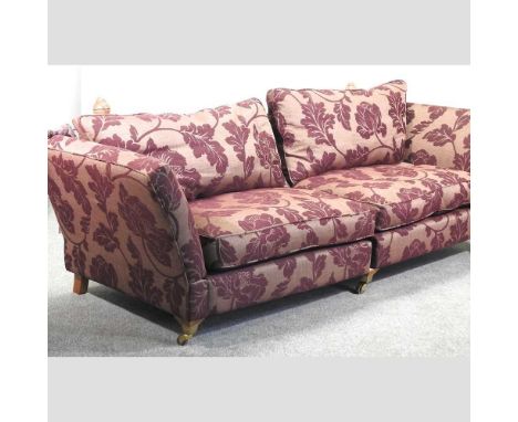 A purple floral upholstered knole sofa, by Ashley Manor265cmCondition report: This is in ok condition overall. There are some