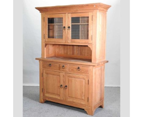 A modern light oak dresser, with a glazed upper section, by Orwell Furniture, Ipswich134w x 48d x 194h cm