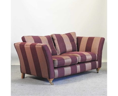 An Ashley Manor burgundy striped upholstered sofa185cm