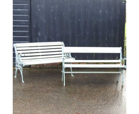 A cast iron and slatted wooden garden bench, together with another smaller (2)