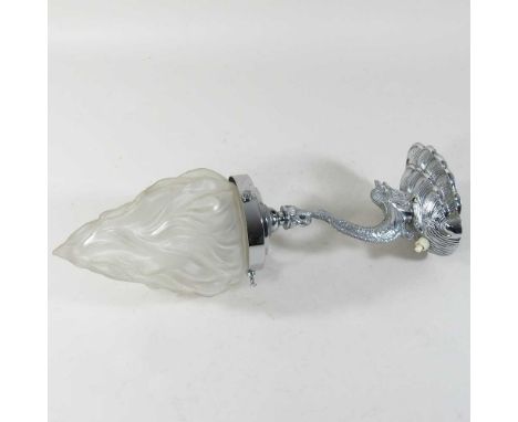 An Art Deco chrome and glass lamp, with a dolphin support and an opaque moulded glass shade36cm high