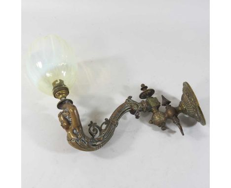 A 19th century ornate cast figural wall light, with a vaseline glass shade26cm longCondition report: Looks to be complete and
