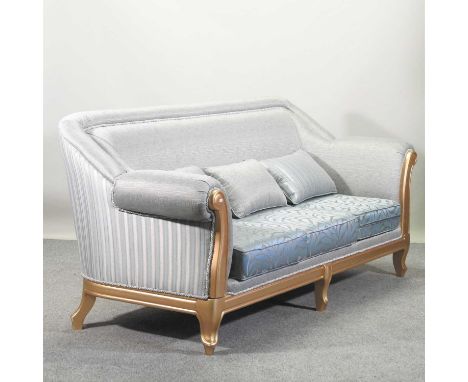 A large gilt framed and pale blue upholstered sofa,222w x 83d x 96h cm