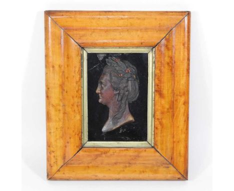 A 19th century wax portrait, of a head in profile, in a maple frame, inscribed to the back born 1729 died 179624 x 20cm overa