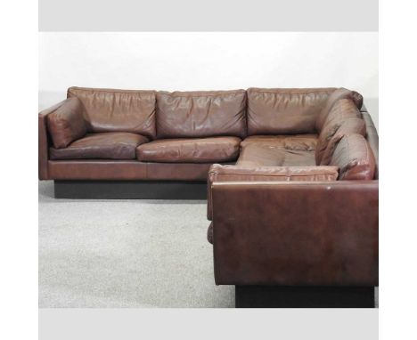 A Danish 1960's design brown 'buffalo' leather upholstered corner sofa, after Georg Thams290 x 220cm overall x 80d cmConditio