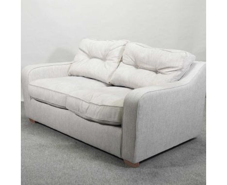 A modern beige upholstered sofa188w x 90d x 73h cmCondition report: Overall condition is good and it does not look very old, 