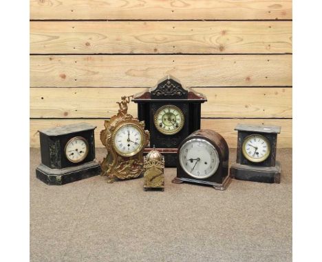 An early 20th century continental brass cased mantel clock, 35cm high, together with a miniature brass cased lantern clock, t