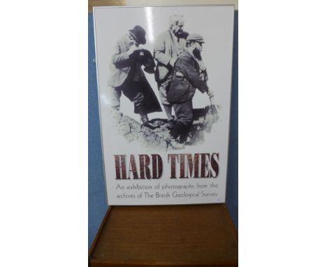 A Hard Times print, framed