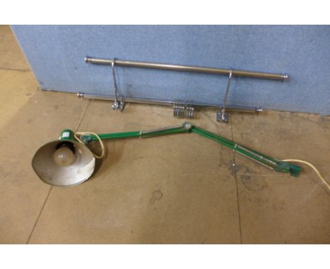 A chrome coat rack and an anglepoise lamp