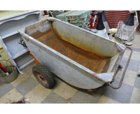 A galvanised trough on wheels