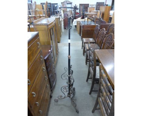 A Victorian Aesthetic Movement wrought iron and copper standard lamp
