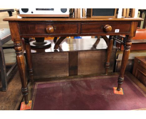 VICTORIAN MAHOGANY SIDE TABLE FITTED WITH TWO DRAWERS ON RING TURNED TAPERED LEGS