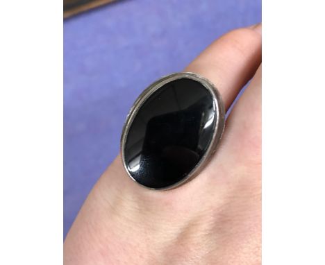 WHITE METAL AND OVOID ONYX SIGNET RING