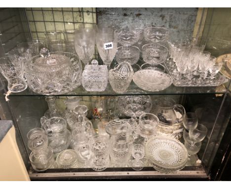 TWO SHELVES OF CUT GLASSWARES - SUNDAE DISHES, ETCHED LIQUEUR GLASSES, COCKTAIL GLASSES, WATER JUG, MALLET DECANTER AND OTHER