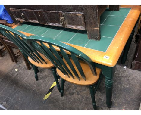 GREEN TILE TOPPED OBLONG KITCHEN TABLE AND FOUR HOOP BACK CHAIRS