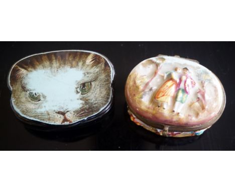 An early 20th Century Italian Capodimonte lidded snuff box relief decorated with figures in landscape, length 5cm, together w