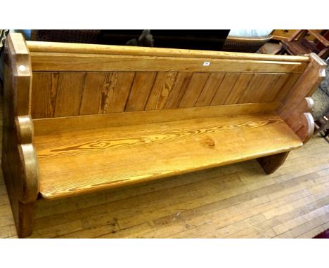 A Vintage pitch pine pew.