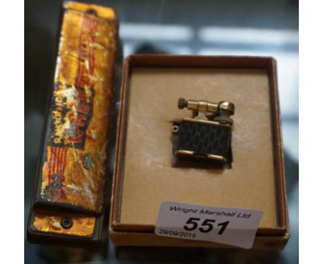 A mixed group of collectable items to include a miniature leather and brass bound travelling lighter, a Wren tremolo harmonic