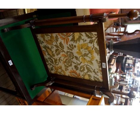 An early 20th Century mahogany fire screen, upholstered with tapestry panel.