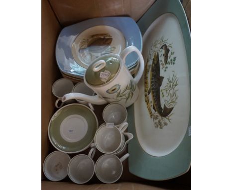 A Susie Cooper bone china tea service together with assorted dinner plates, depicting fish.