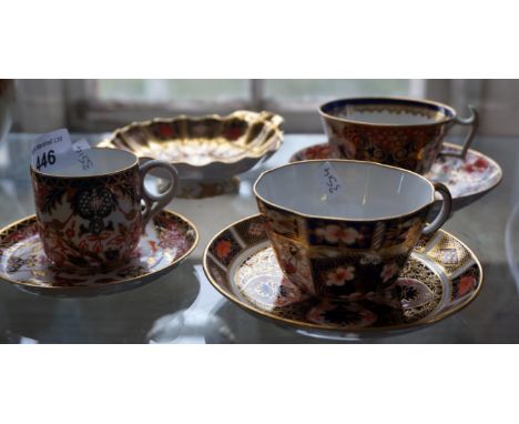 A mixed group of Royal Crown Derby items to include three Royal Crown Derby cups and saucers, one decorated in the 2451 patte