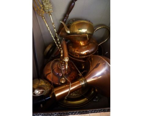 A large quantity of assorted metalware to include a copper kettle, copper hunting horn, brass tripod table etc.