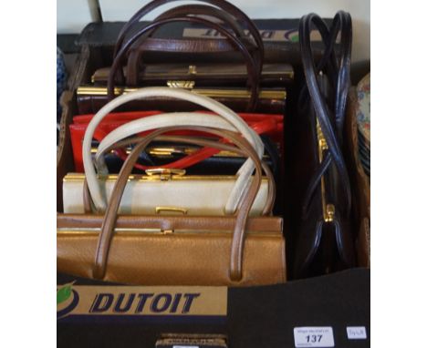 Seven assorted vintage ladies handbags.