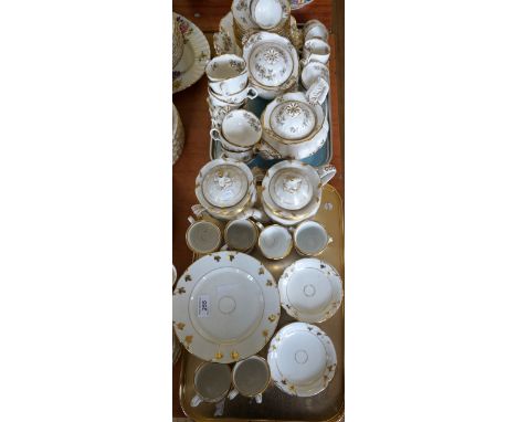 A good quality 19th Century porcelain forty four piece tea service, having gilt scrolling decoration, together with a 19th Ce