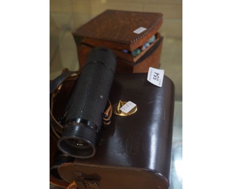 A set of Carl Zeiss D-Alt binoculars, set within original case, together with a wooden box of vintage marbles.