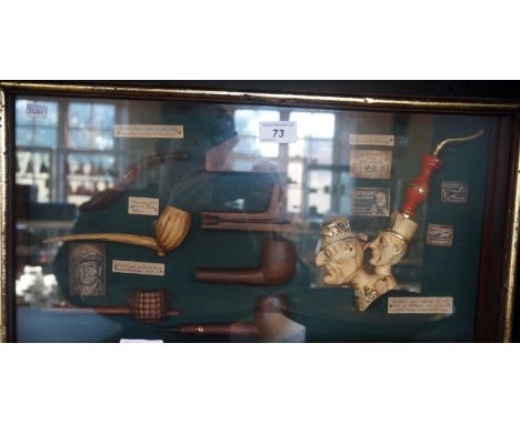 A modern glass cased pipe montage.
