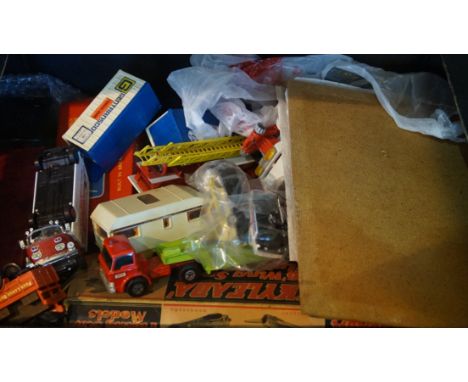 Two boxes of assorted vintage diecast toys.