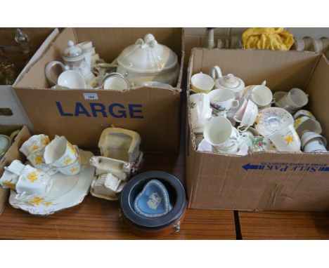 Two boxes of assorted tea services and tea ware, to include various cups and saucers, etc. 