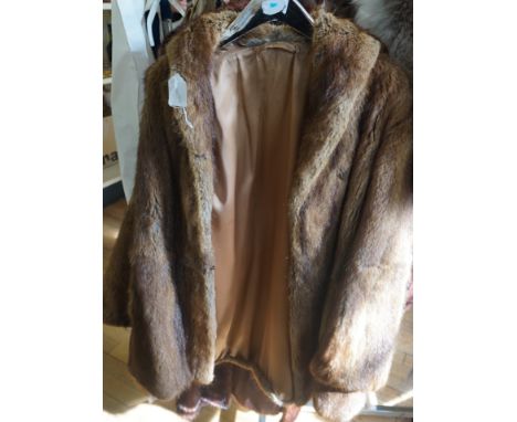 Two ladies Vintage fur coats.
