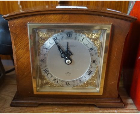 An Elliott mahogany mantel clock, retailed by Mappin and Webb.