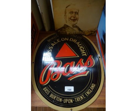 A collection of assorted breweryania advertising items to include a vintage Worthington sign, a Bass enamel sign, collection 